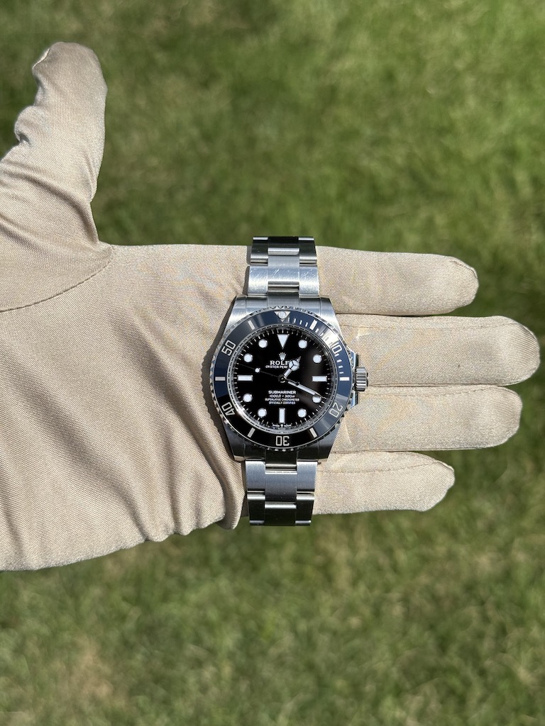 Rolex Submariner No-Date ref 124060 in hand